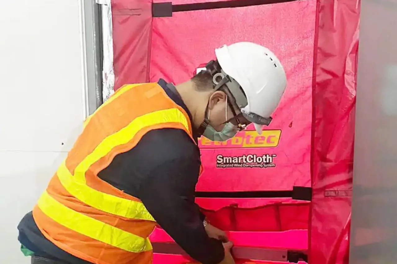 FM200 room integrity door fan test being set up on a server room door in Saudi Arabia